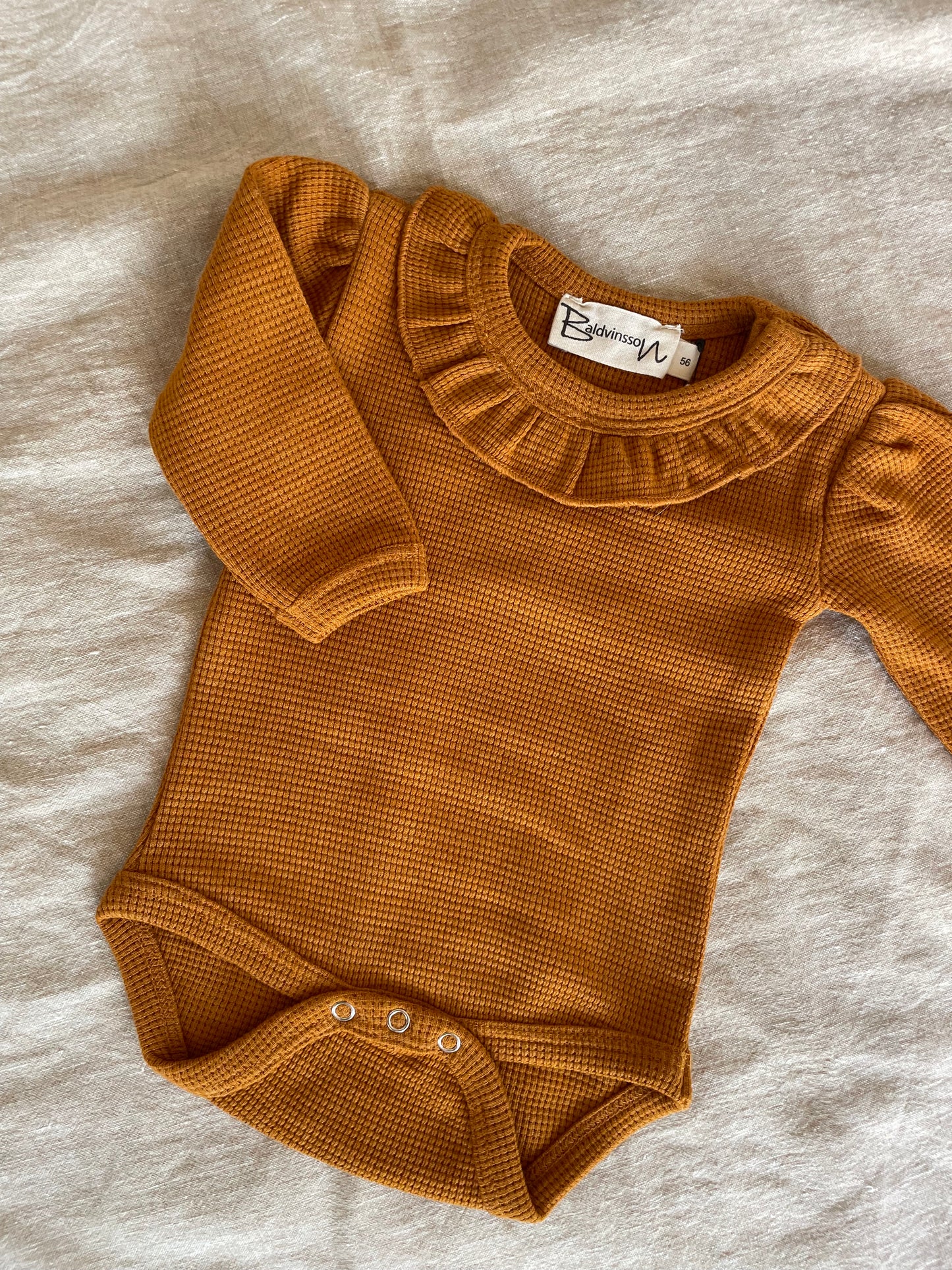 Bodystocking i orange vaffelstof