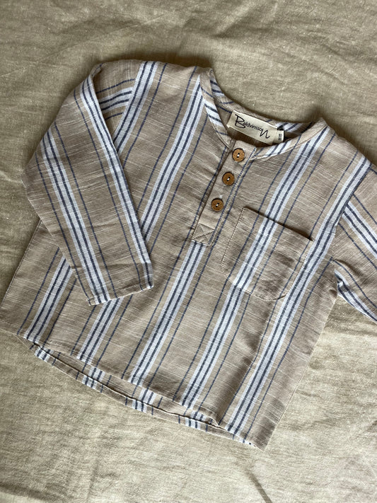 Sand colored shirt with blue and white stripes