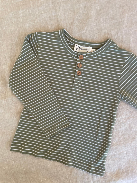 Green shirt with white stripes